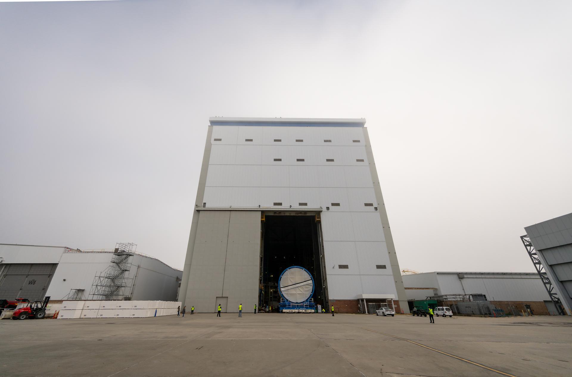 Move crews at NASA’s Michoud Assembly Facility in New Orleans, lift the forward-joined flight hardware for the agency’s SLS (Space Launch System) rocket out of a stacking cell in the vertical assembly building on Dec. 19, 2025. The forward join, which consists of the intertank, liquid oxygen tank, and forward skirt, will be used on the core stage slated for NASA’s Artemis III mission. Teams moved the flight hardware from the cell and set it atop self-propelled mobile transporters. The article was brought to the factory’s final assembly area on Dec. 27, 2025 where it will be mated to the core stage’s previously joined liquid hydrogen tank and undergo further integration.    The core stage, along with its four RS-25 engines, produce more than two million pounds of thrust to help launch NASA’s Orion spacecraft, astronauts, and supplies beyond Earth’s orbit and to the lunar surface for Artemis.